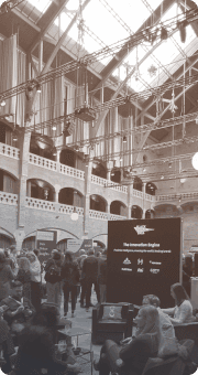 IIEX exhibition floor with booths and attendees